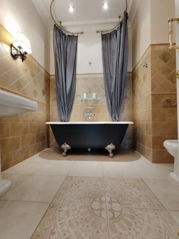 5-комнатная квартира на Суворовском проспекте