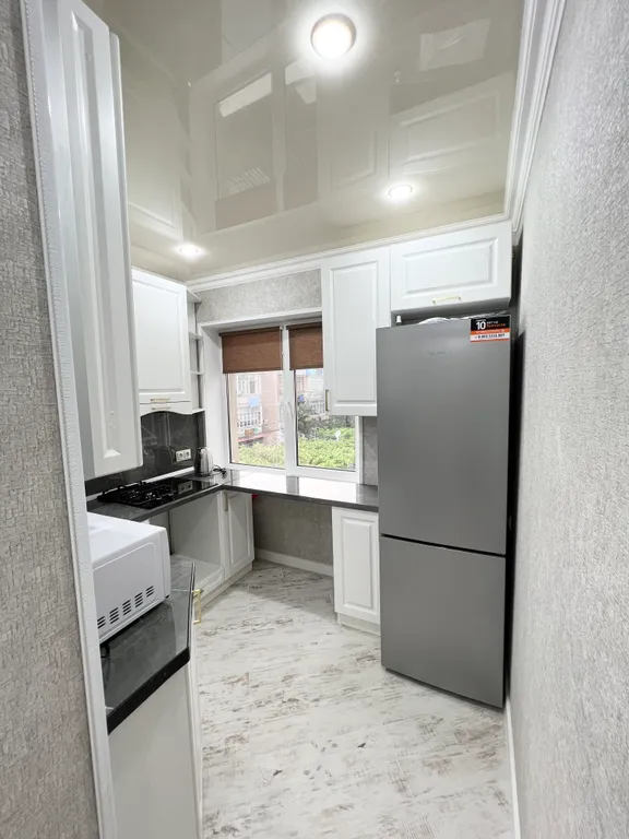 Апартамент с видом на море и на колесо обозрения