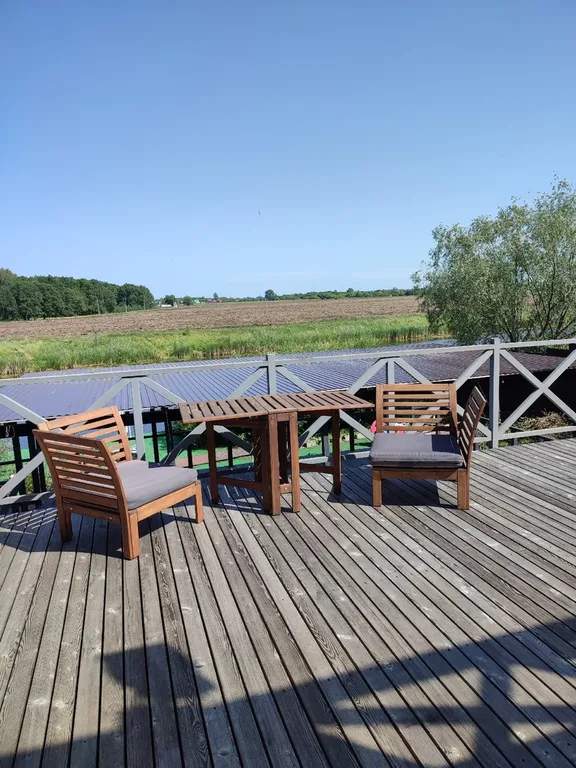 Большой дом с баней, бассейном и видом на озеро