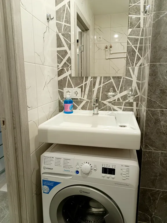 Уютная студия в новом доме с видовым балконом