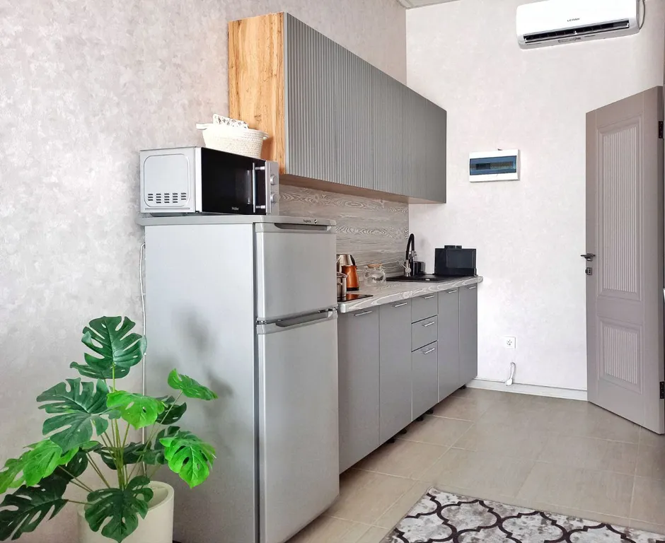 Комфортный семейный номер-студия с видом на горы