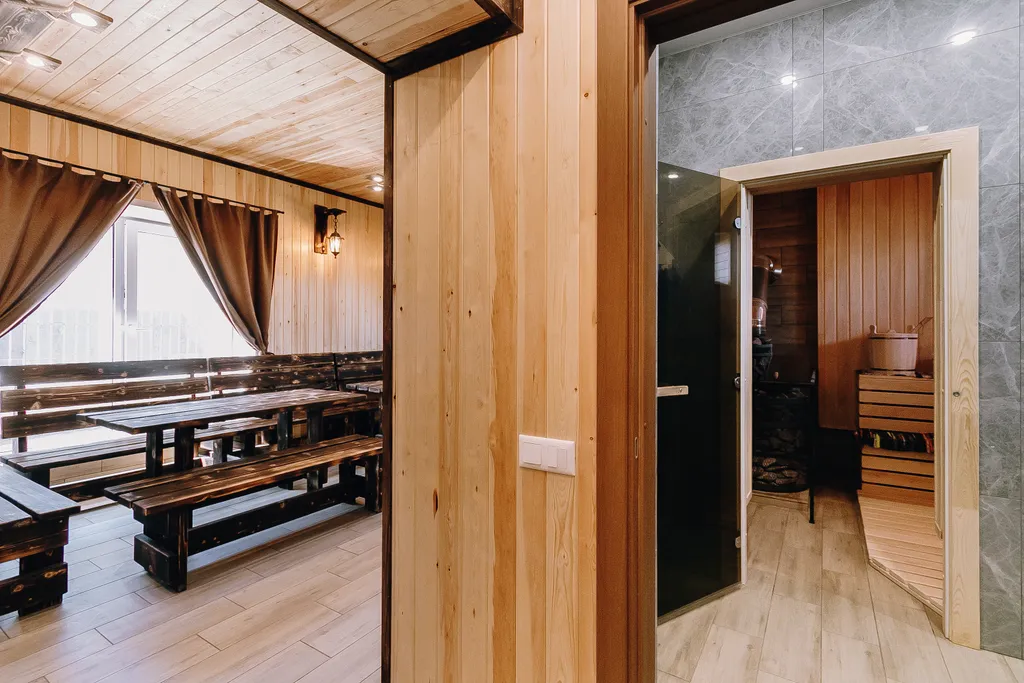 Коттедж двухэтажный с сауной, бассейном, детской площадкой