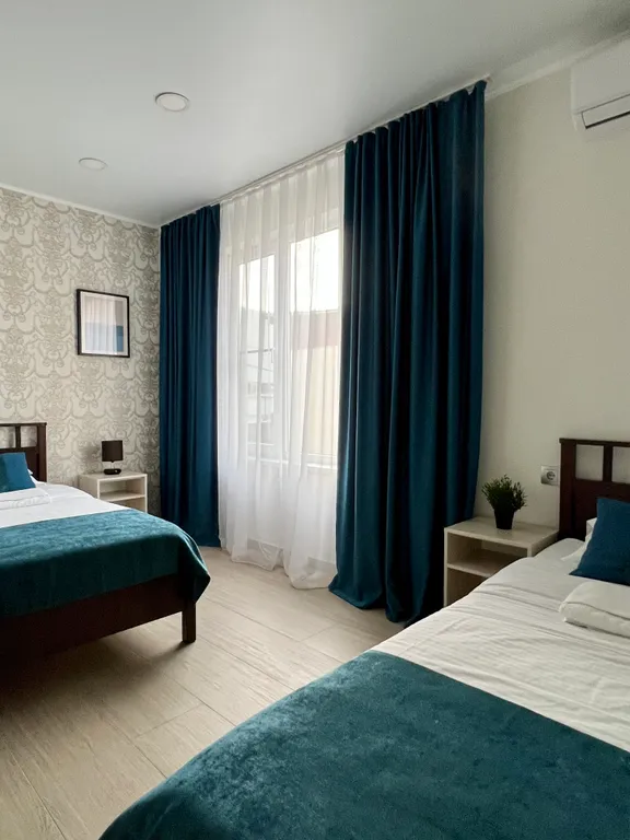 Квартира Квартира Уютный номер с 1 двуспальной или 2 раздельными кроватями — Сириус