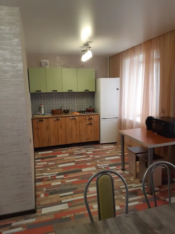 Просторная с большой кухней-гостиной