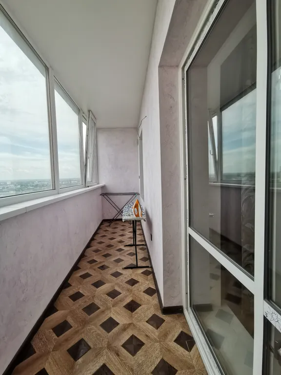 Солнечная квартира с видом на город