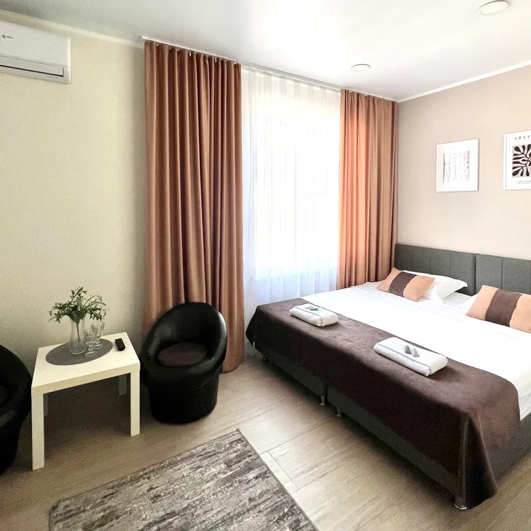 Квартира Квартира Уютный номер с 1 двуспальной или 2 раздельными кроватями — Сириус