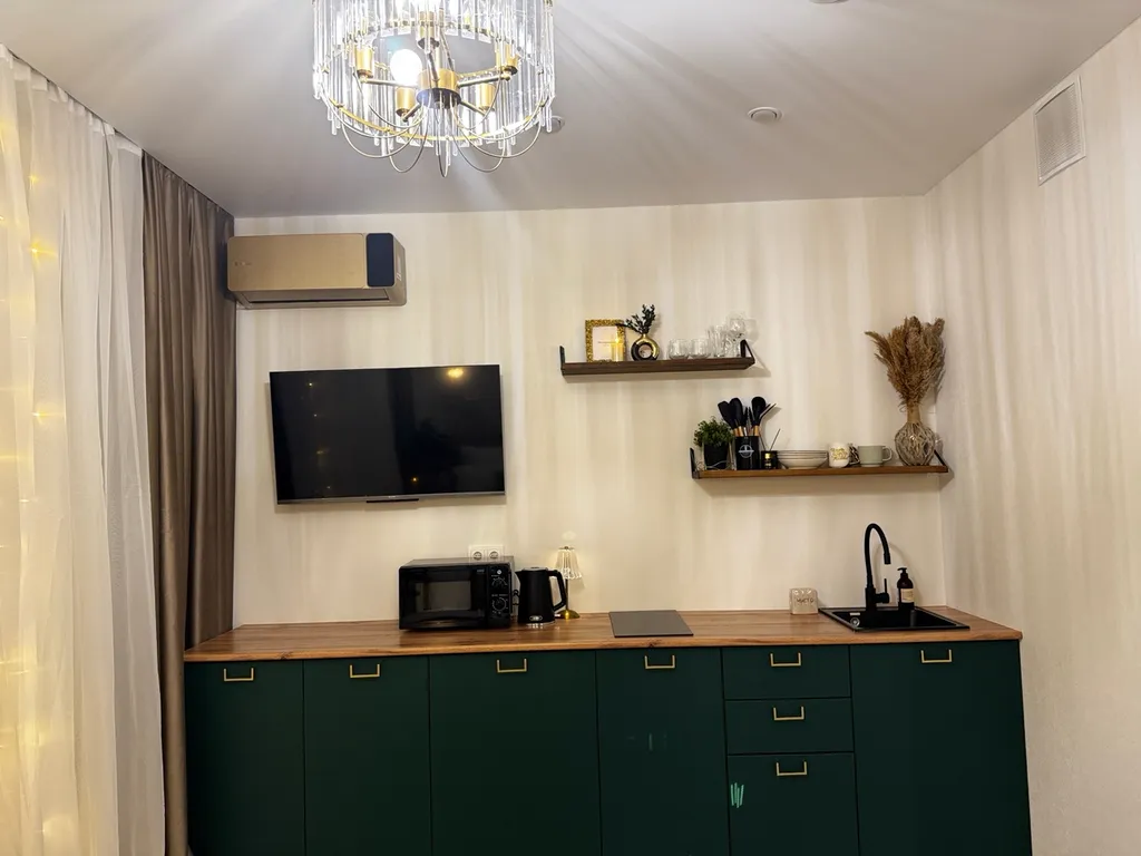 Дизайнерская студия в изумрудном цвете