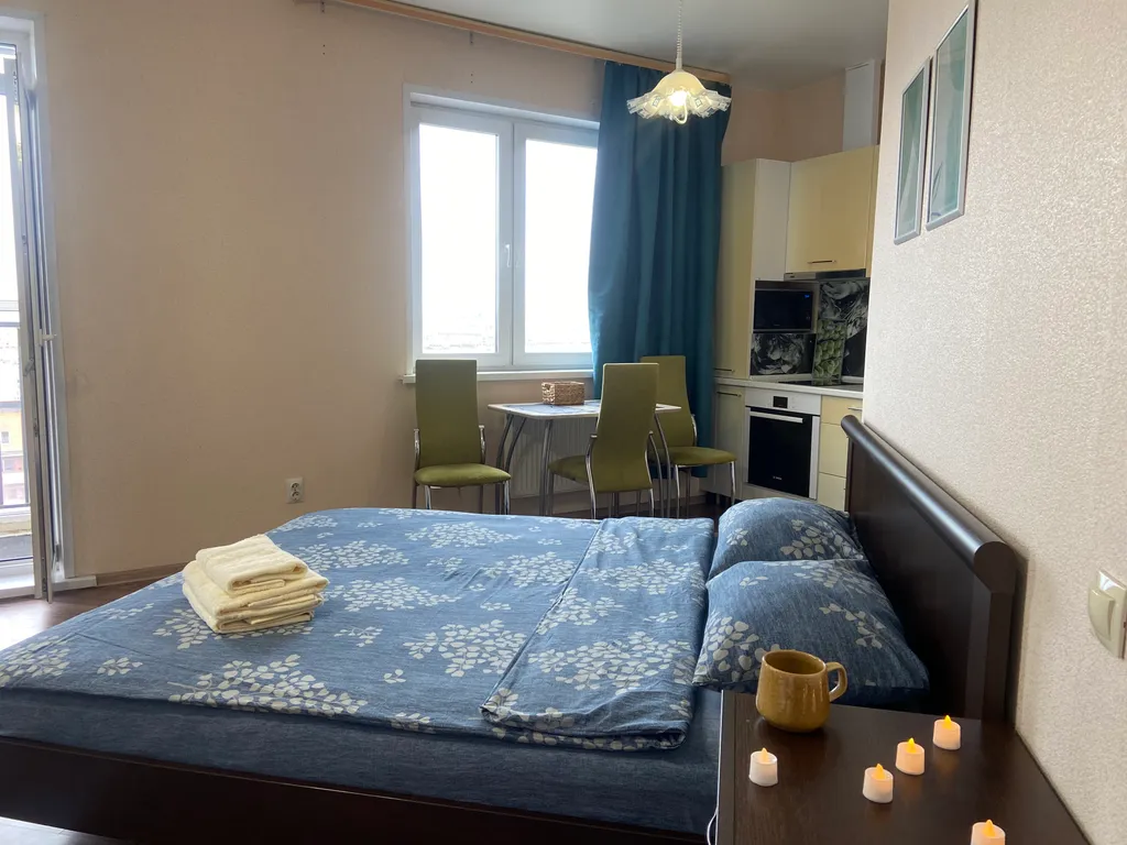 Уютная студия с панорамным видом на город