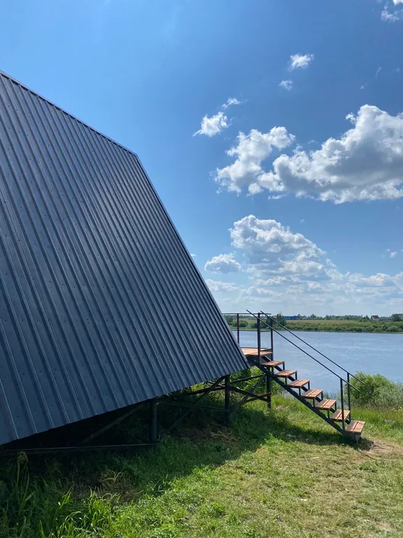 Smaland Ranta house-шале на высоком берегу с видом на реку и закат