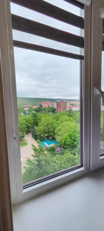 Уютная, новая  квартира в центре города с видом на гору Пушкинтау