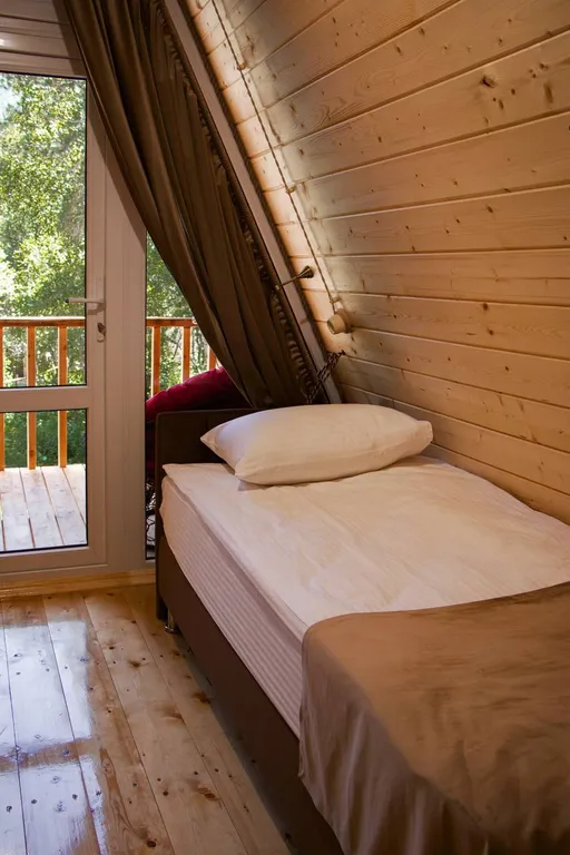 Двухэтажный A-Frame шале посреди заповедного леса вблизи Эльбруса