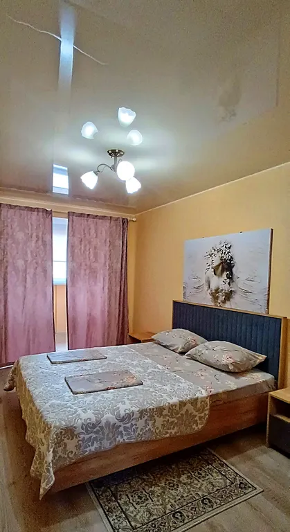 Квартира с видом на набережную и горы