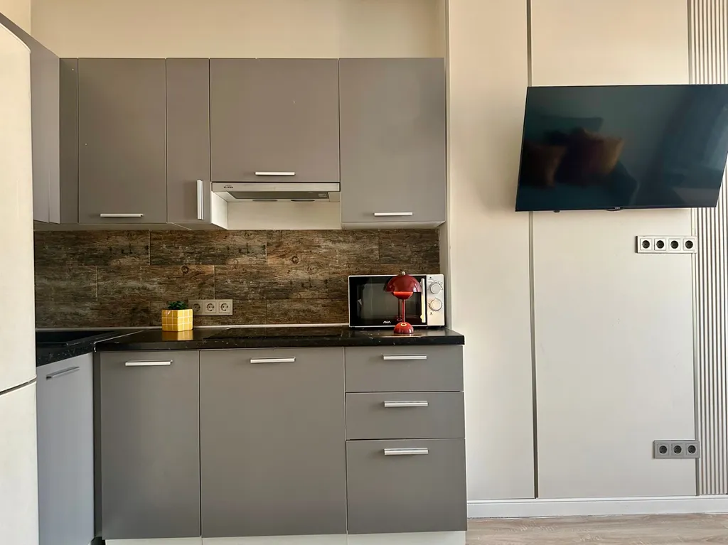 Квартира Уютная студия Нурай в центре Алматы — Алматы