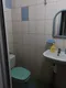 Туалет с умывальником на четыре комнаты.