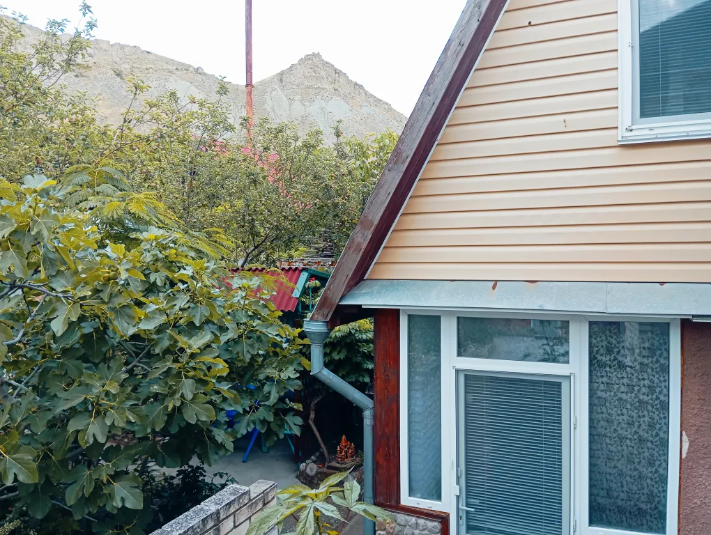 Деревянная мансарда с балконом