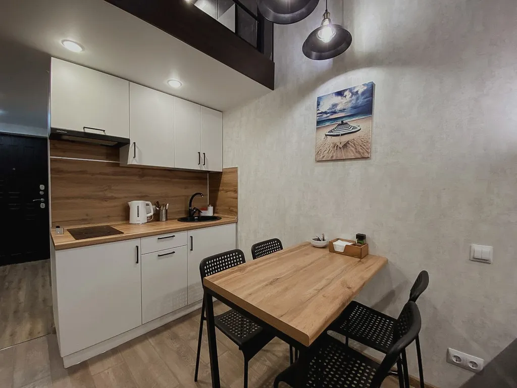 Дизайнерская двухуровневая квартира с панорамными окнами