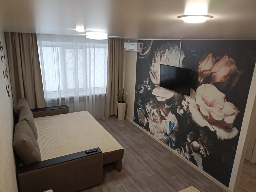 1-комнатная квартира в центре города с асфальтированной парковкой