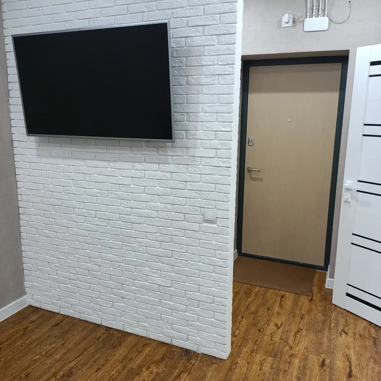 Уютная студия в зеленом массиве