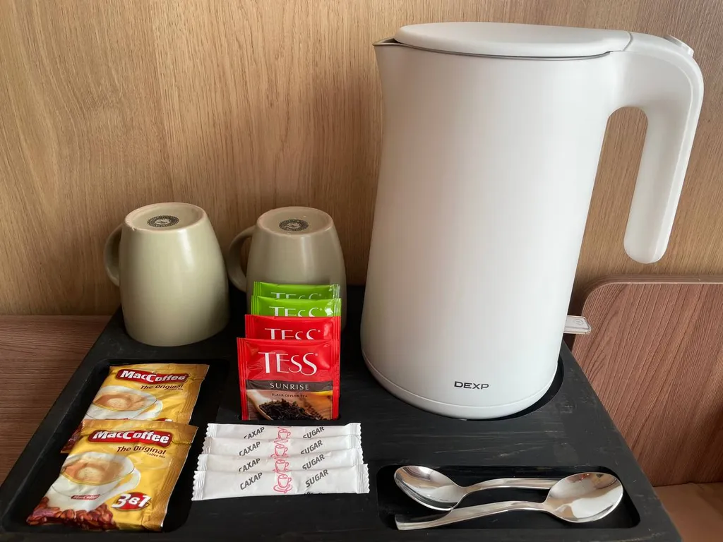 Новый уютный номер с двумя раздельными односпальными кроватями