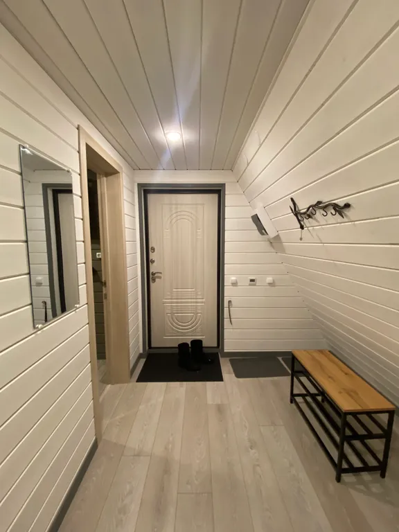 Треугольный дом