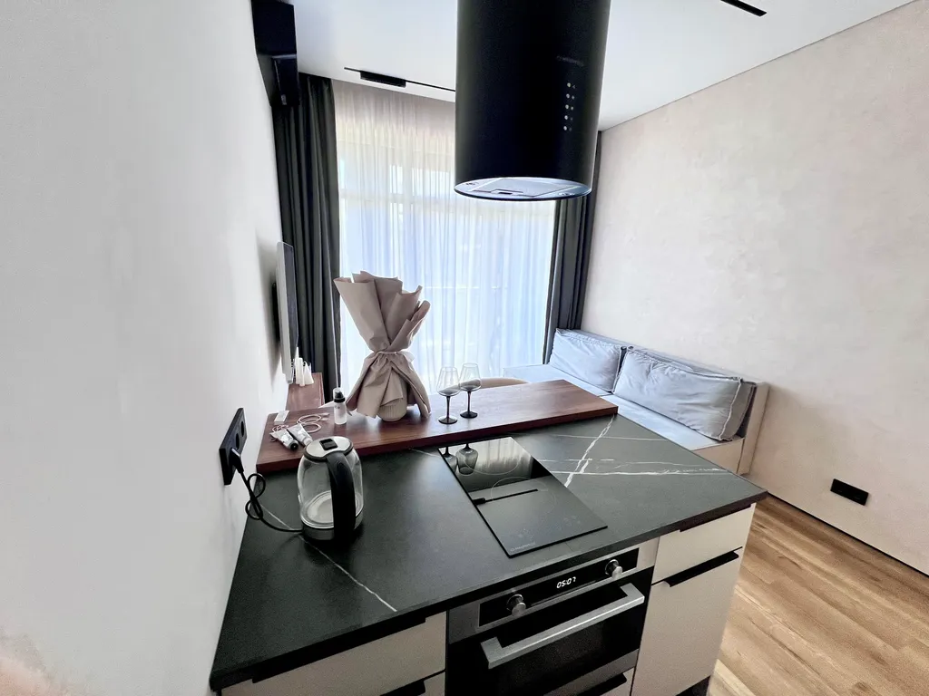 Уютная квартира в центре с балконом и видом на горы