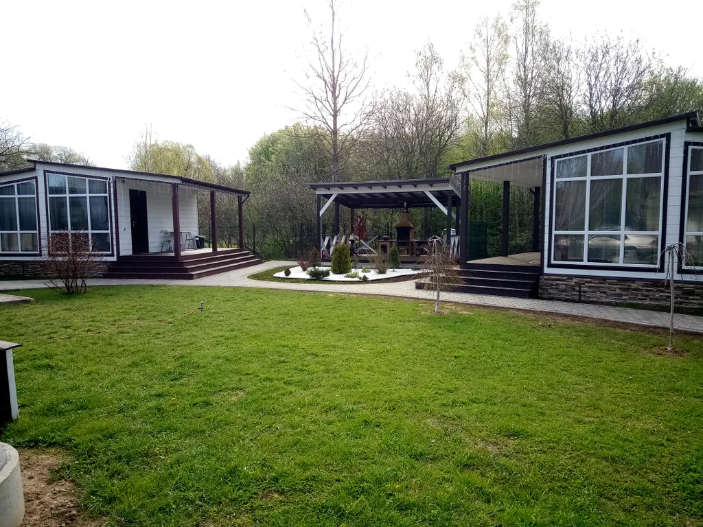 Уютный коттедж с баней и подогреваемой купелью.