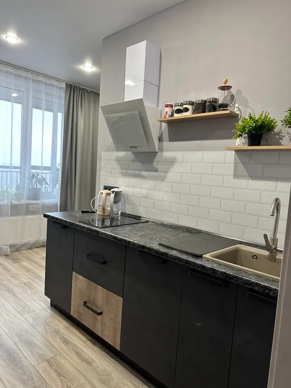 Уютная студия с видом на город