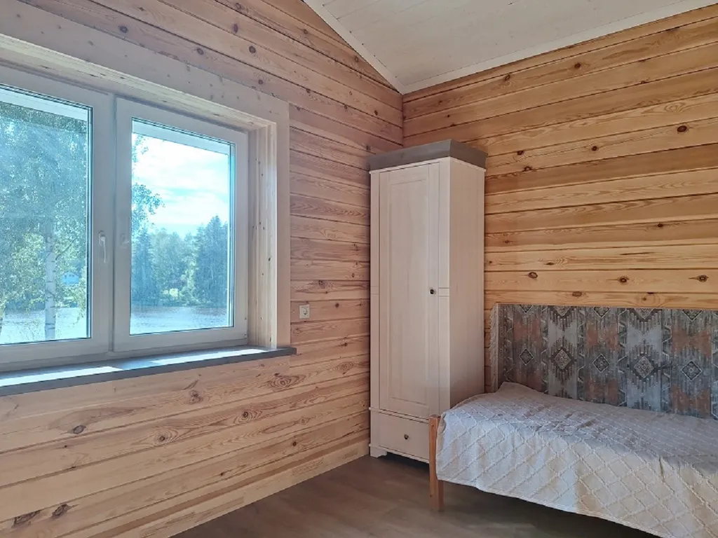 Коттедж на берегу реки в Рощино