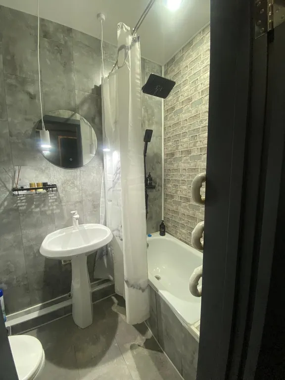 Уютная студия в стиле лофт — ваш комфортный отдых в центре города