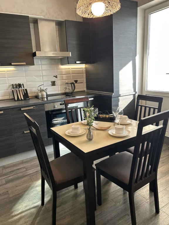 Просторная и теплая квартира с панорамным видом в центре города