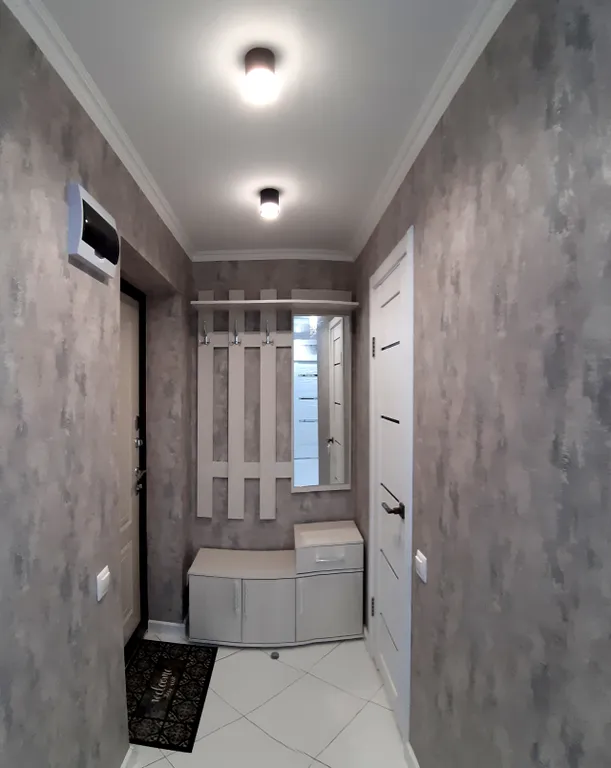 Стильная небольшая квартира с раздельными спальными местами