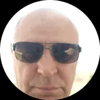 Николай