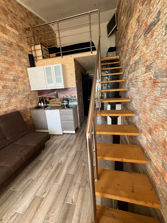 Двухуровневая студия с видом на море