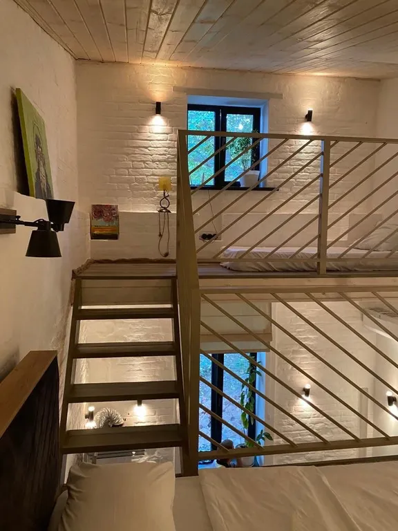 Уютные трехуровневые апартаменты в стиле Лофт в центре города Уровни