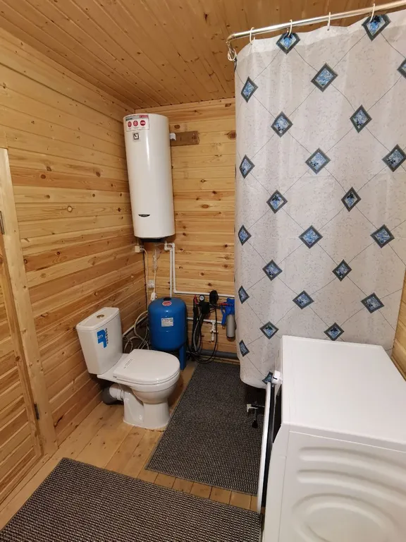 Уединённый загородный дом с баней на большом участке