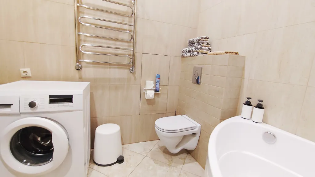 Просторный апартамент с панорамным видом на горы в центре. Спальня