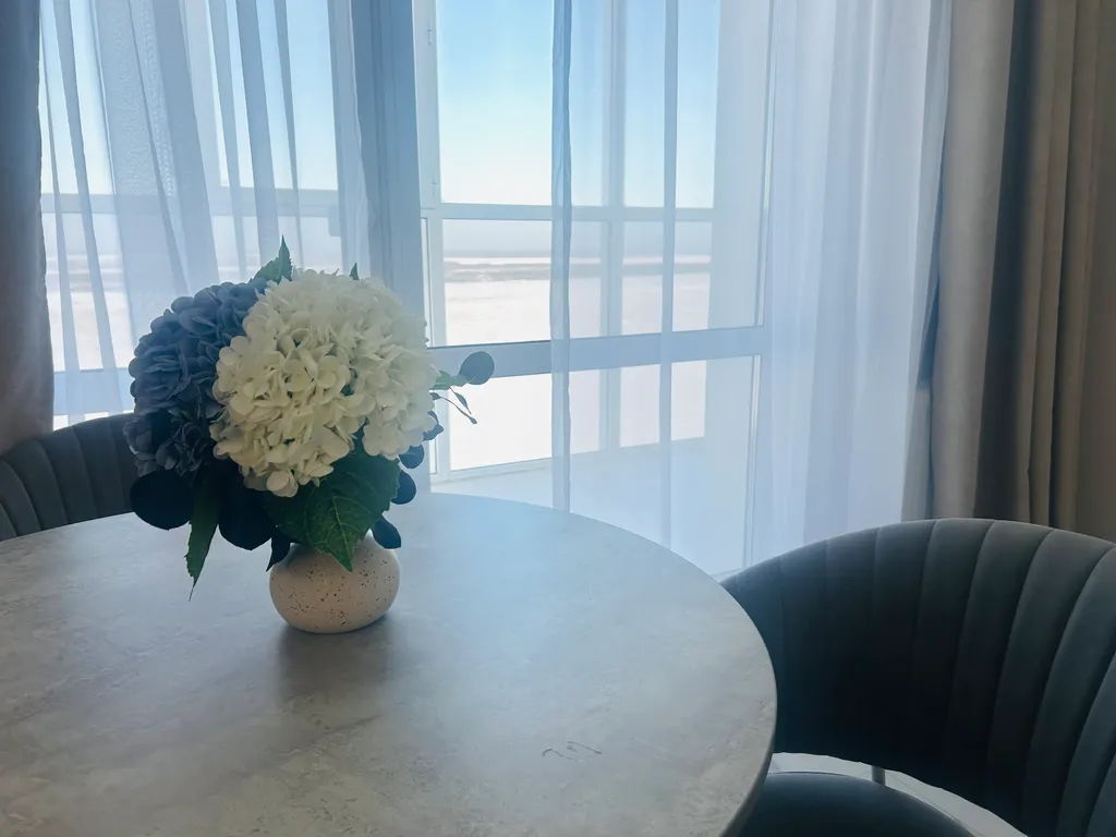 Стильные апартаменты Rich с шикарным видом на город и реку Амур.