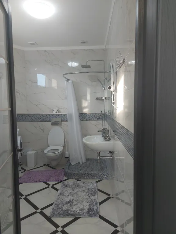 Современные апартаменты в гостевом доме с видом на море