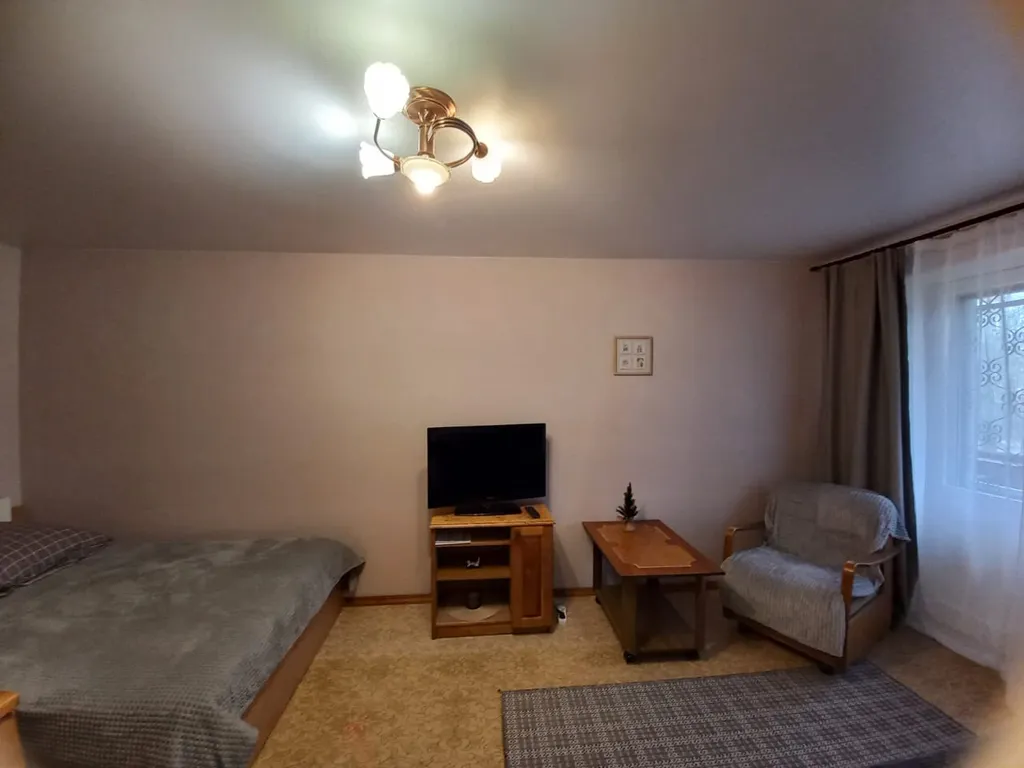 Квартира в доме у сквера