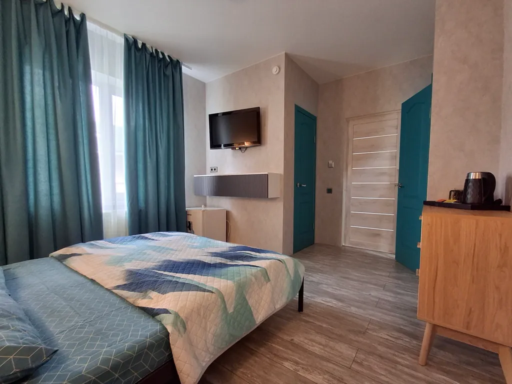 Улучшенный двухместный номер с двуспальной кроватью 1, 6, 10, 14