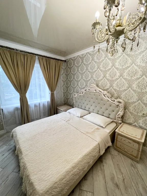 Апартамент с видом на море и на колесо обозрения