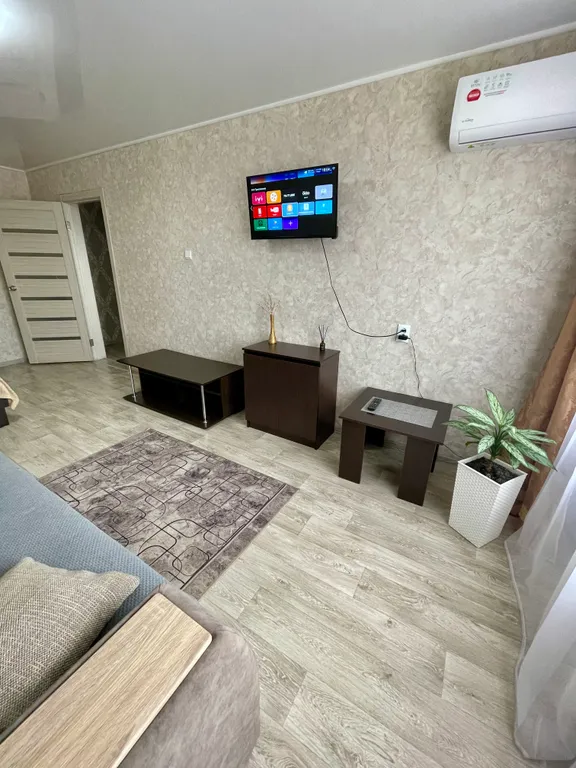 Уютная квартира в центре города с красивым видом города из окна