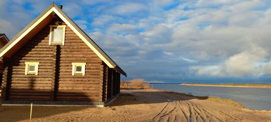 Дом с баней на берегу Северной Двины