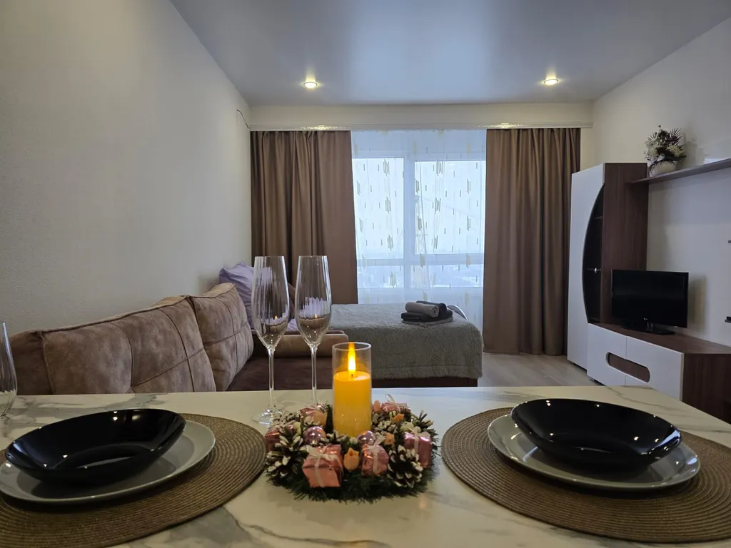 Уютная студия с видом на город