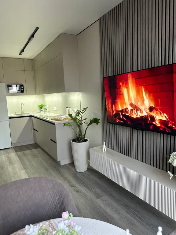 Уютная квартира в новом комплексе с дизайнерским ремонтом