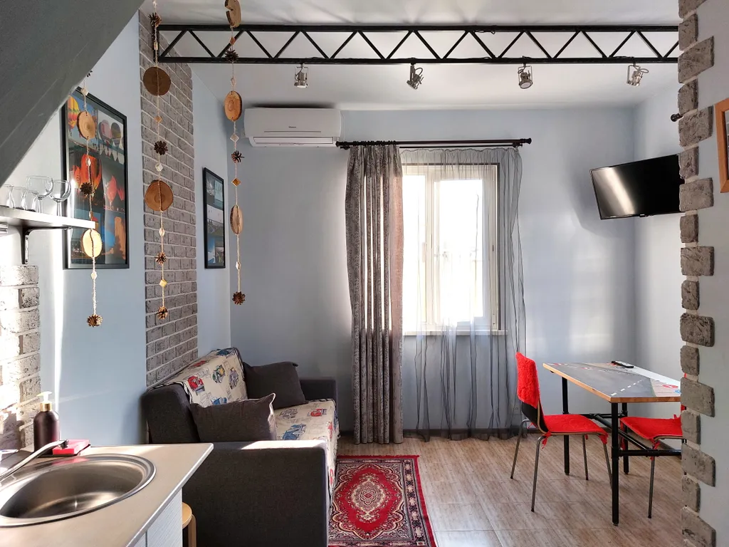 Двухуровневая квартира с выходом в сад