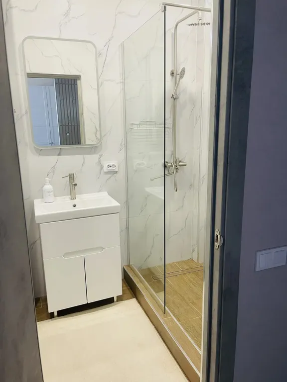 Уютная квартира в тихом районе с развитой инфраструктурой.