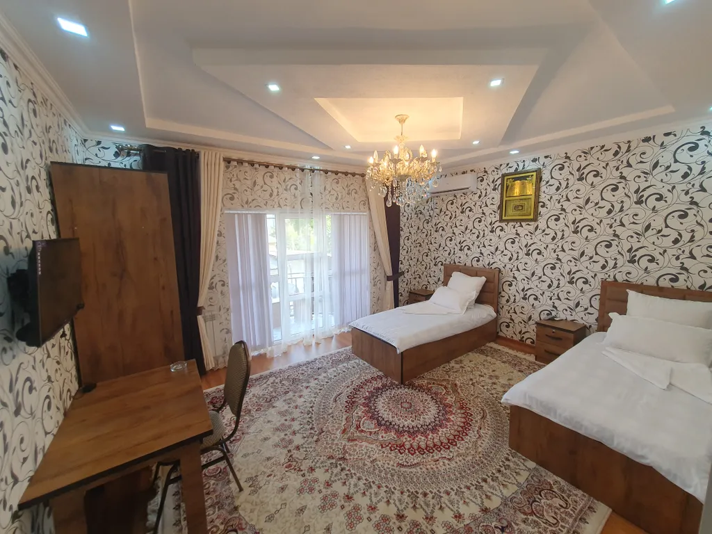 Двухместный номер с 2 отдельными кроватями и балконом, завтрак включен