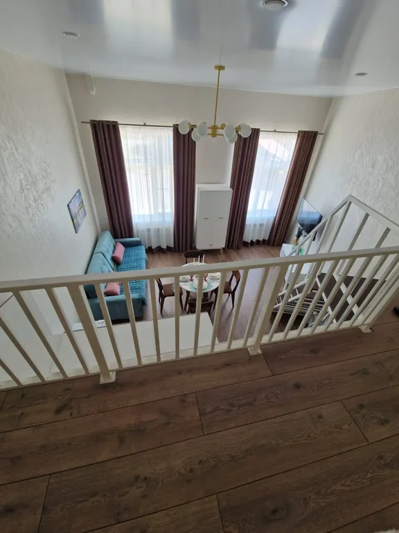 Уютная двухуровневая студия в центре