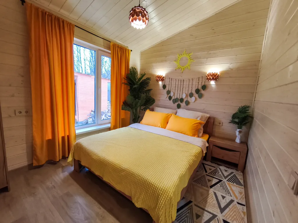 Дом шале с горячей купелью на террасе